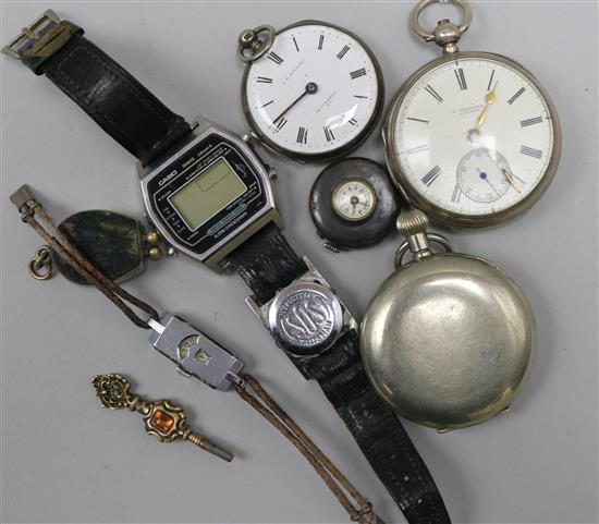 Two silver pocket watches, a black dial pocket watch, a jump hour digital watch and four other items.